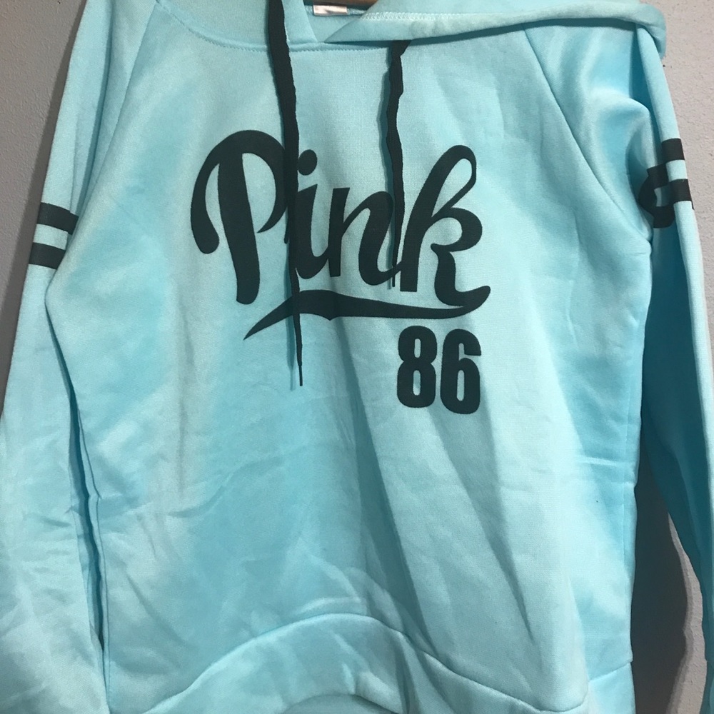Light blue hoodie. XL but fits more like a M/L